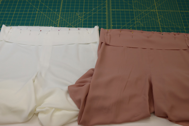 How To Pin Sew Waistbands Waistlines - White Polyester Double Georgette - Mood Fabrics - Ojai Reversive Wide Leg Pants Free Sewing Pattern Tutorial - MDF545 - Mood Fabrics Sewciety Blog - Pin and sew the waistbands right sides together with their respective waistlines.