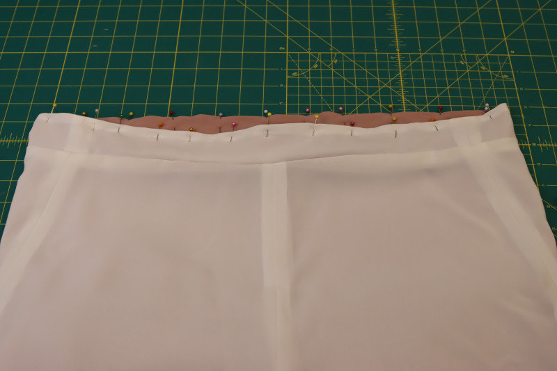 How To Topstitch Waistband Top Edge - Gutermann Sew All Thread - Mood Fabrics - Ojai Reversive Wide Leg Pants Free Sewing Pattern Tutorial - MDF545 - Mood Fabrics Sewciety Blog - Topstitch over the folded edge at the top of the waistband.
