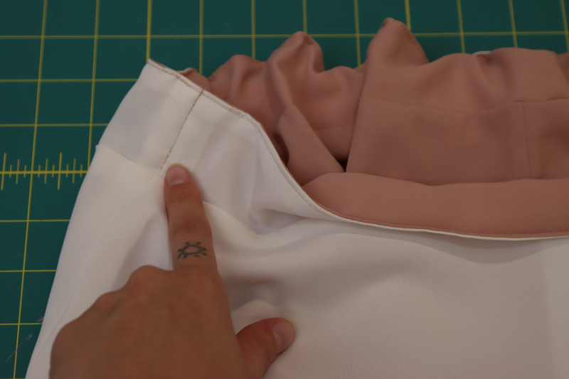 How To Sew Elastic Side Seams - Gutermann Sew All Thread - Mood Fabrics - Ojai Reversive Wide Leg Pants Free Sewing Pattern Tutorial - MDF545 - Mood Fabrics Sewciety Blog - Sew a stitch in the side seam of the pants to secure the elastic.