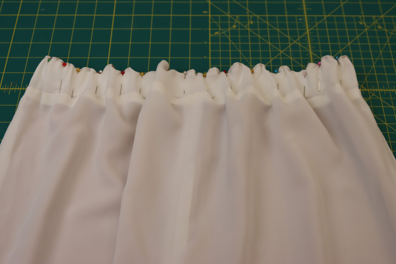 How To Topstitch Stretched Elastic Waistband - 1.5 Inch Waistband Elastic - Mood Fabrics - Ojai Reversive Wide Leg Pants Free Sewing Pattern Tutorial - MDF545 - Mood Fabrics Sewciety Blog - Topstitch over the stretched elastic to secure it to the waistband.
