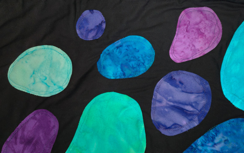 free motion stitching used to attach appliques and quilt